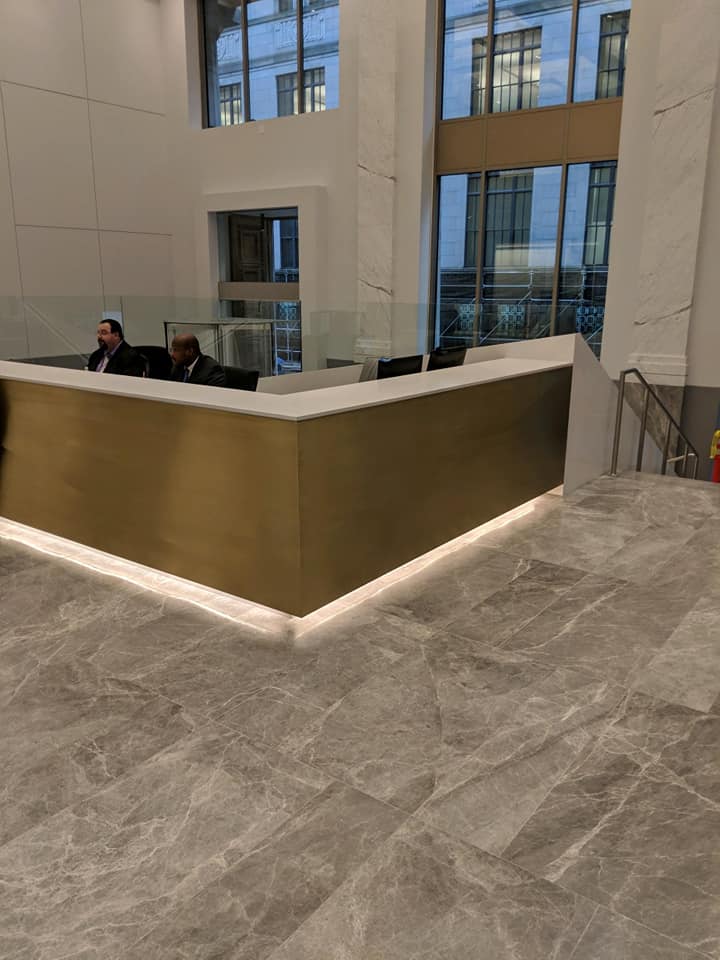 reception desk with gold finish