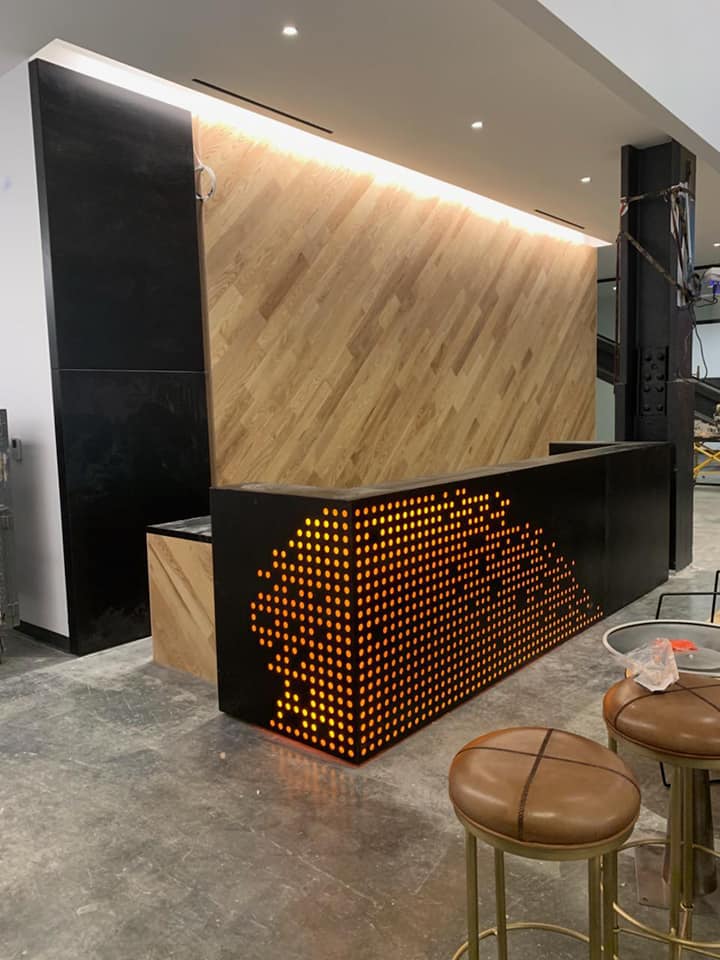 reception desk with black and gold