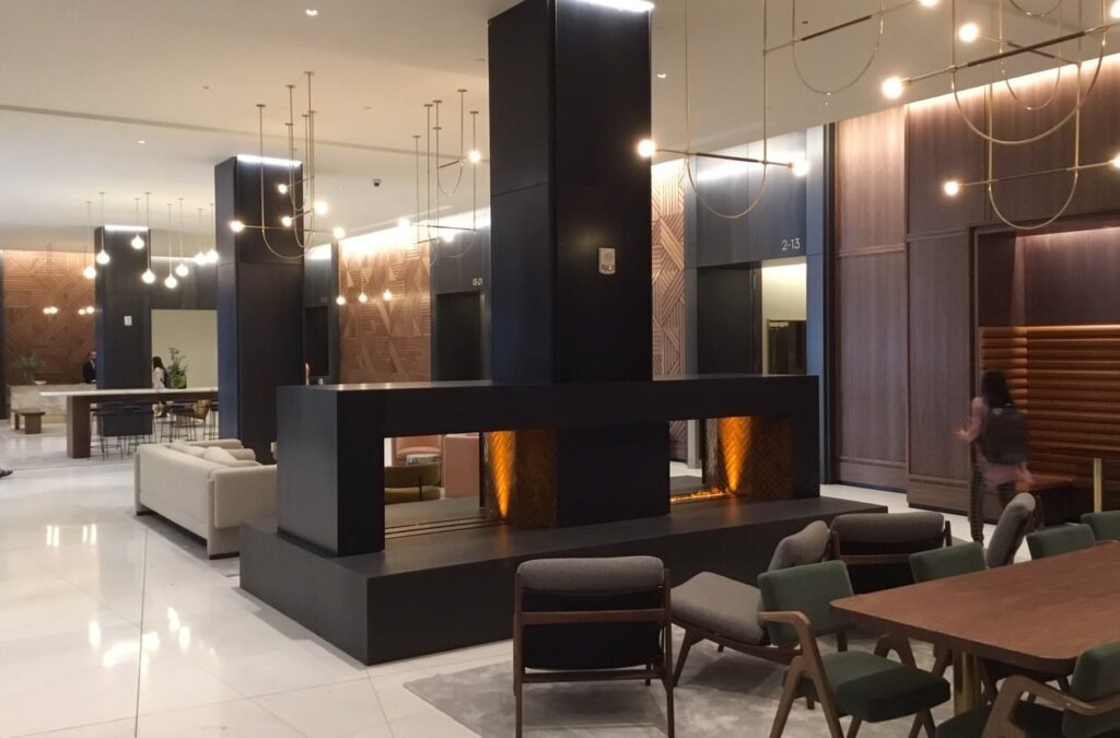 business lobby with modern fireplace and seating area